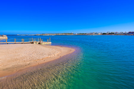 Relaxing at beach with pier at white beach - travel destination for vacation - Hurghada, Red Sea, Egyptの写真素材