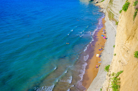 Loggas beach at Peroulades is a paradise beach at high rocky white cliff and crystal clear azure...