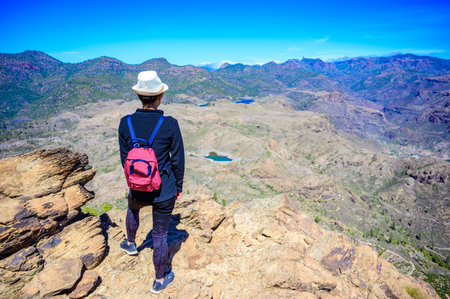 Woman Hiking in Mountain Scenery of Gran Canaria Island - beautiful landscape scenery at mountain...