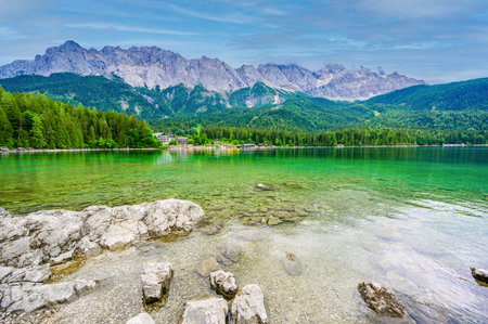 Eibsee lake  Zugspitze mountain in  background. Beautiful landscape scenery  paradise beach