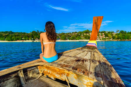 The small Monkey beach in paradise Bay - about 5 minutes boat ride from the Ao Ton Sai Pier - Koh Phi Phi Don Island at Krabi, Thailand - Tropical travel destinationの写真素材