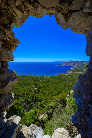 Monolithos Castle in paradise landscape scenery - travel destination on beautiful island Rhodes, Greeceの写真素材