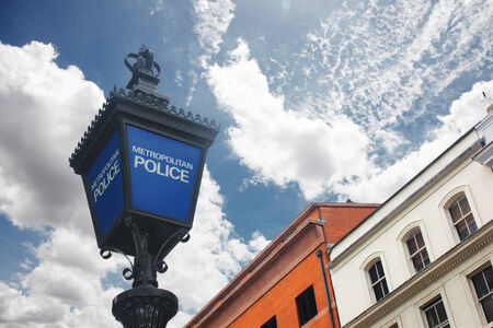Metropolitan Police Sign in London, Englandの写真素材