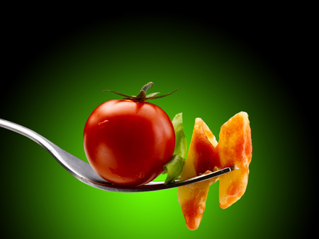 Basil pasta and tomato sauceの写真素材