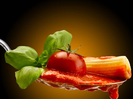 Basil pasta and tomato sauceの写真素材