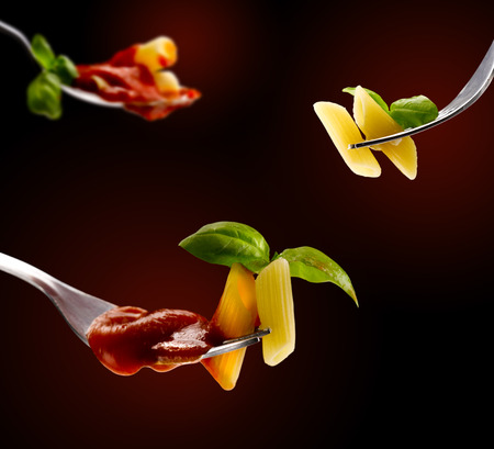 Basil pasta and tomato sauceの写真素材
