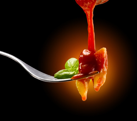 Basil pasta and tomato sauceの写真素材