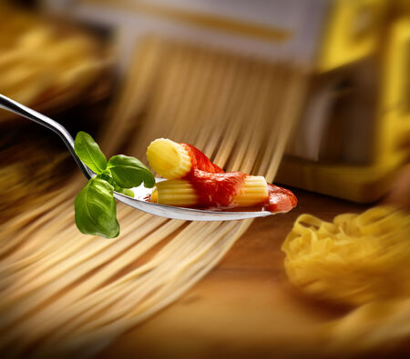 Basil pasta and tomato sauceの写真素材