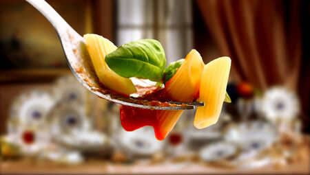 Basil pasta and tomato sauceの写真素材
