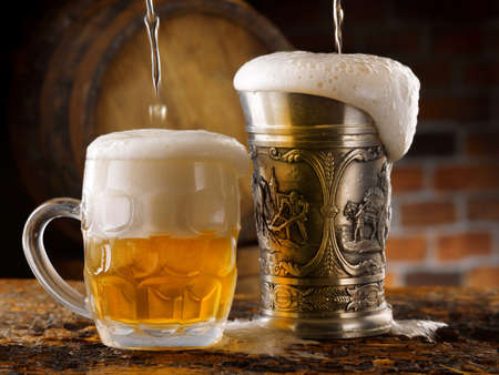 stunning photo shots of beer mugs in the cellarの写真素材