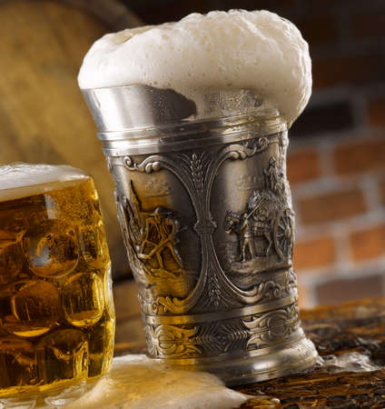 stunning photo shots of beer mugs in the cellarの写真素材