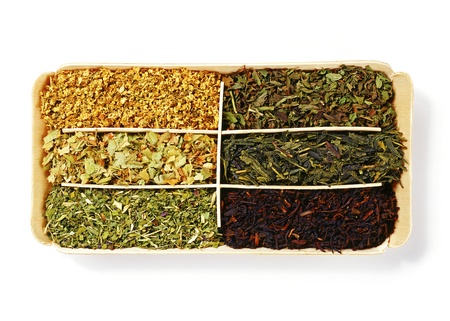 loose herb teas over whiteの写真素材
