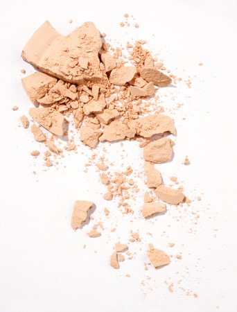 crushed face powder over white backgroundの写真素材