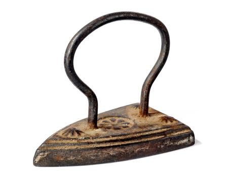 old antique iron isolated over white backgroundの写真素材