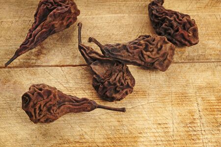 Dried pears over wooden backgroundの写真素材