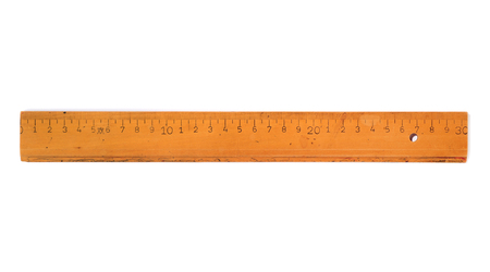 old 30 cm wooden ruler isolated on a white backgroundの写真素材