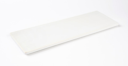 empty white serving plate isolated over white backgroundの写真素材