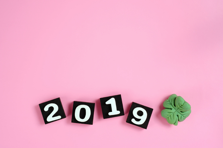 pink background of the new year 2019 with shamrockの写真素材