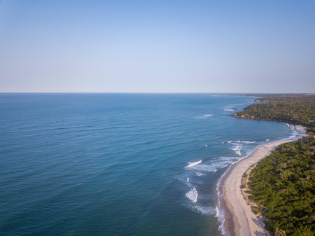Drone picture of the waves hitting the beach on the Swahili Coast, Tanzania.