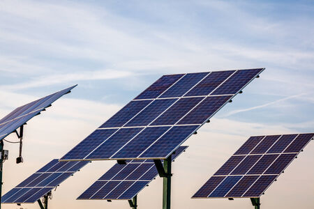 solar panel in the middle of land on skyの写真素材