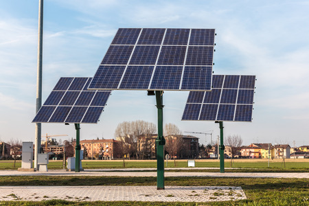 solar panel in the middle of land on sky and building backgroundの写真素材