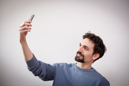 smiling selfie of young manの写真素材
