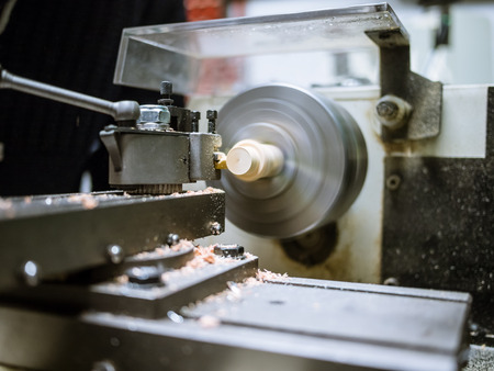 crafthmanship of wood on the lather spinningの写真素材