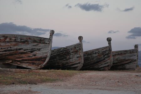 Four old wooden tuna boatsの写真素材
