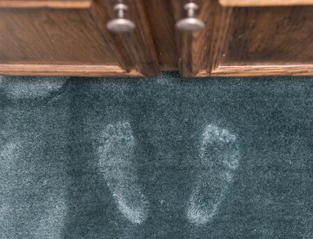 green bath mat with footprints. Bathroom sceneの写真素材