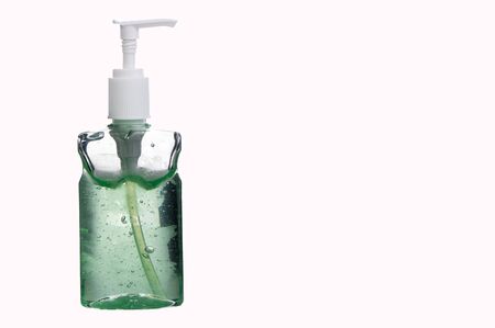 Corona virus prevention hand sanitizer green gel for hand hygiene on white background with copy spaceの写真素材