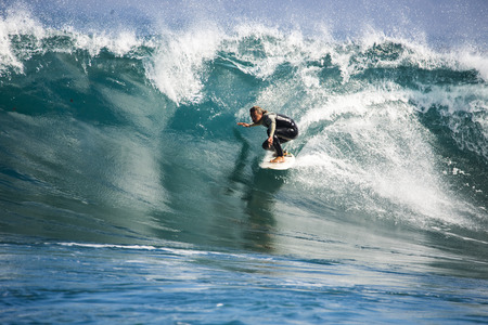 fuerteventura - 2016-10-23: training athlete surfing during a winter training session in fireのeditorial素材