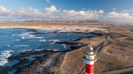 aerial view of lighthouse at sunset, north-west coast of fuerteventuraの写真素材