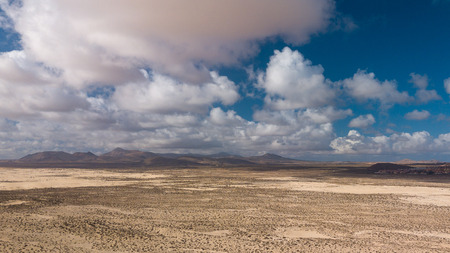 aerial view of desert and volcanic mountains, fuerteventuraの写真素材