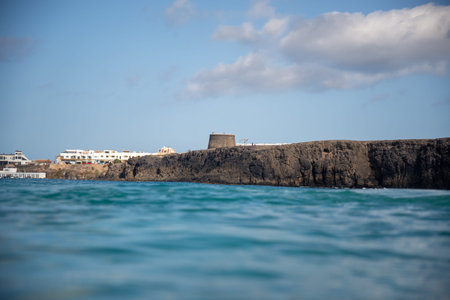 view of the cliff with the Torre del Cotillo, fuerteventura