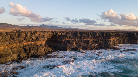 aerial view west coast of Fuerteventura at sunset, canary islandsの写真素材
