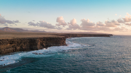 aerial view west coast of Fuerteventura at sunset, canary islandsの写真素材