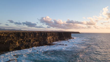 aerial view west coast of Fuerteventura at sunset, canary islandsの写真素材