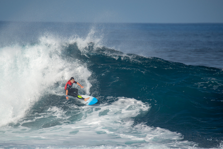lanzarote - november 29, 2018: surfer in the big wave, competitionのeditorial素材
