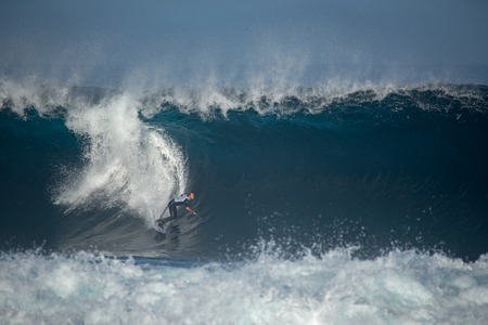 lanzarote - november 29, 2018: surfer in the big wave, competitionのeditorial素材