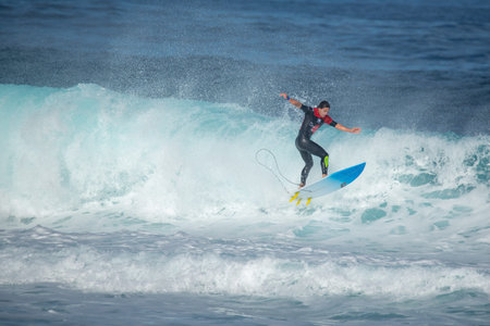lanzarote - november 29, 2018: surfer in the big wave, competition