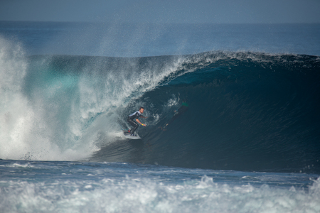 lanzarote - november 29, 2018: surfer in the big wave, competitionのeditorial素材