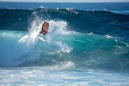 lanzarote - november 28, 2018: surfer in the big wave, competitionのeditorial素材