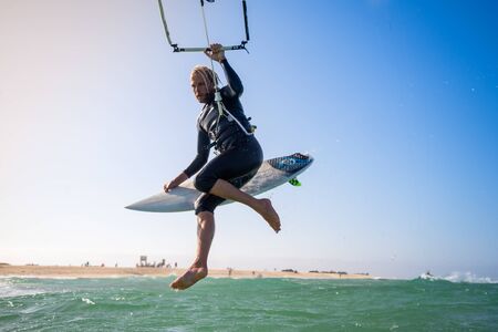 The kite surfer rides the waves of the Atlantic Oceanの写真素材