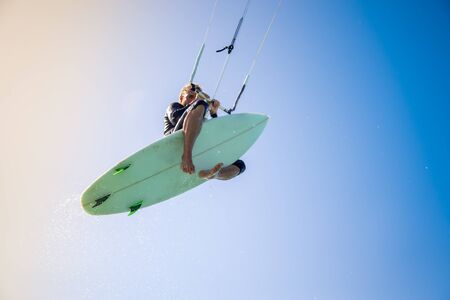 The kite surfer rides the waves of the Atlantic Oceanの写真素材