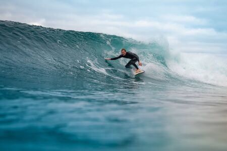 Surfer riding waves on the island of fuerteventuraのeditorial素材