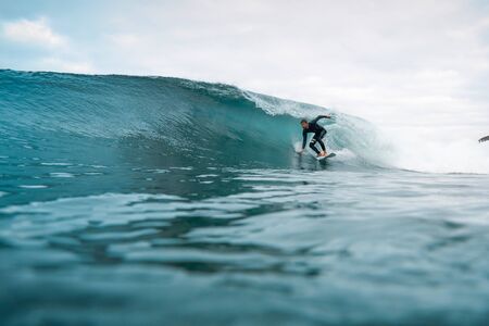 Surfer riding waves on the island of fuerteventuraのeditorial素材