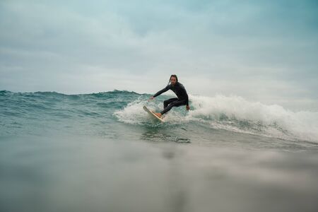 Surfer riding waves on the island of fuerteventuraのeditorial素材