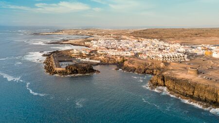 Small village located along the west coast of fuerteventura El Cotilloの写真素材