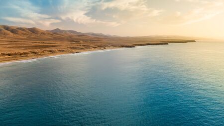 Aerial view west coast of Fuerteventura at sunset,images taken near the small village El Cotillo, canary islandsの写真素材