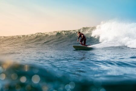 Surfer riding waves on the island of fuerteventuraのeditorial素材